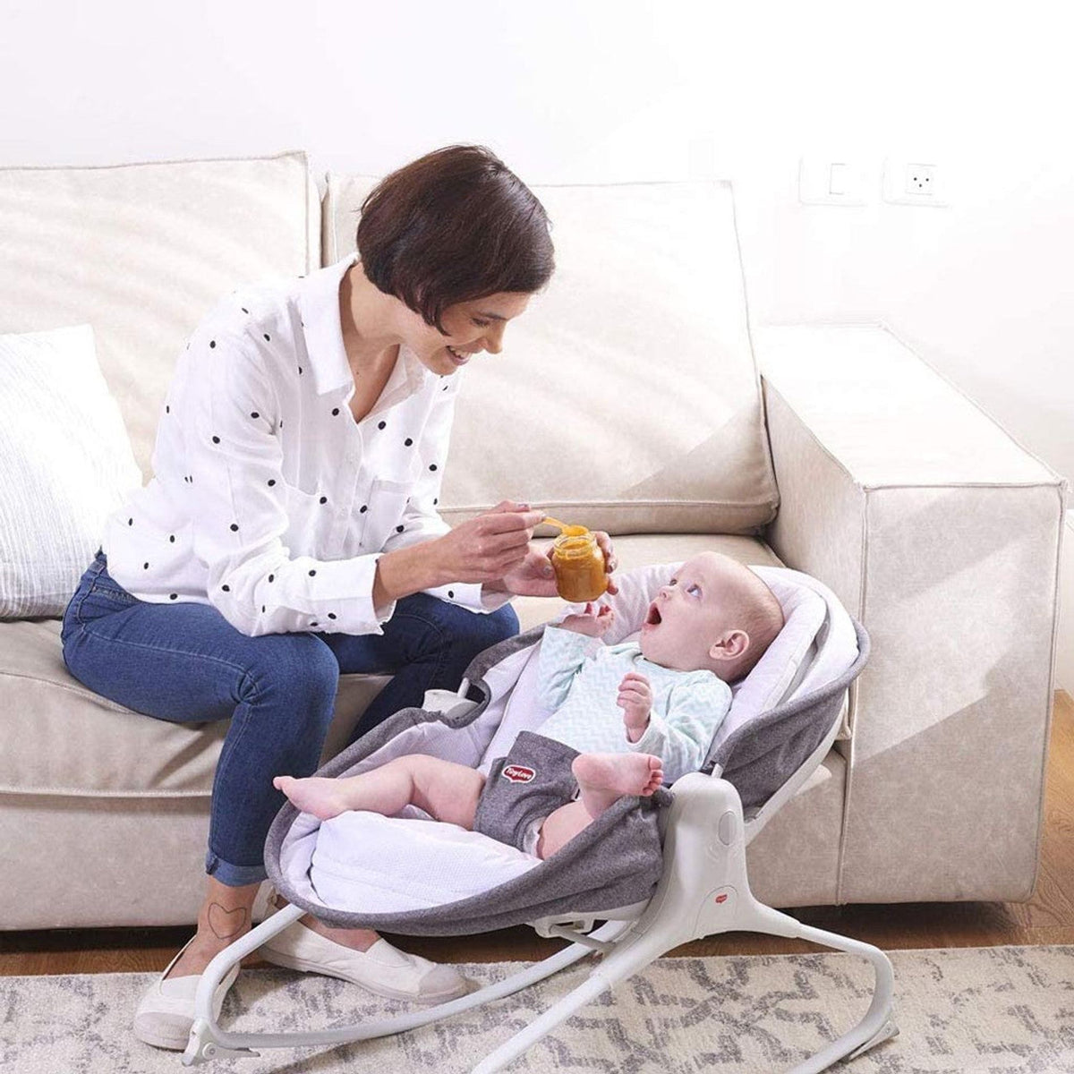 Tiny Love 3-in-1 Rocker-Napper – parent feeding baby